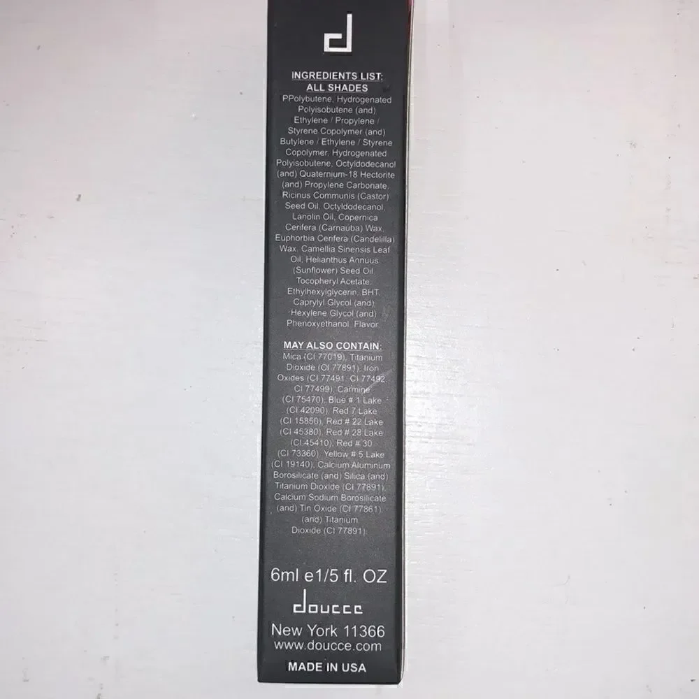 New in box Doucce Gloss wear shiny lip gloss in Color 770 dark coral